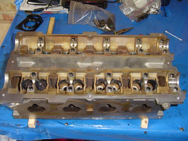 Cylinder head, tappet bores moly greased ready for oil seals and valves